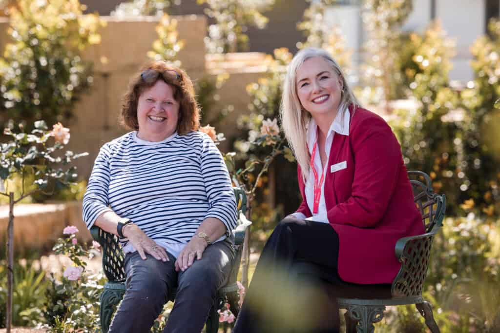 margaret with a client outdoor area